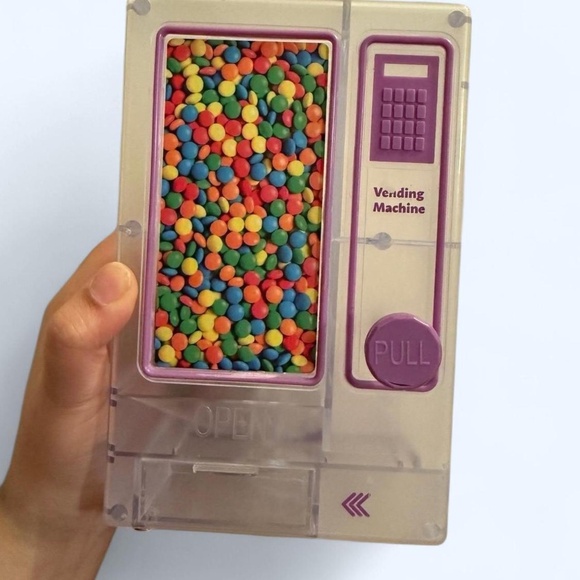 Clear plastic vending machine with colorful candy - Picture 1 of 2